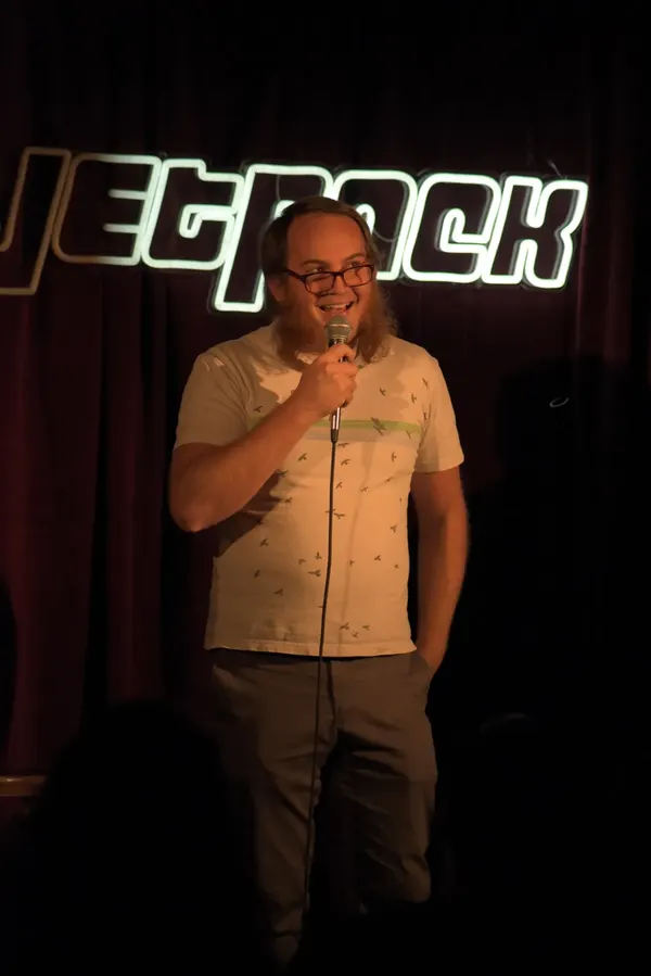 A comedian on the Jetpack stage