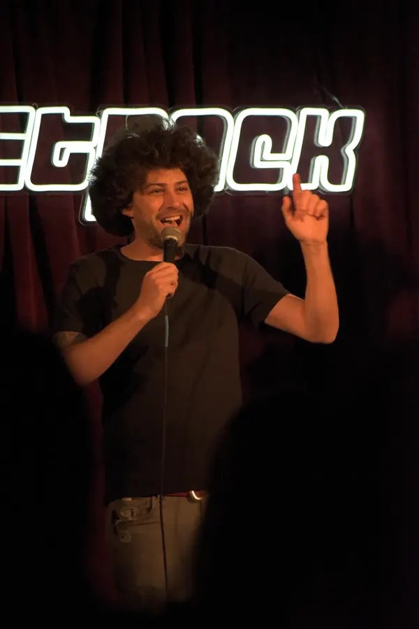 A comedian on the Jetpack stage
