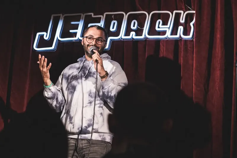 A comedian on the Jetpack stage