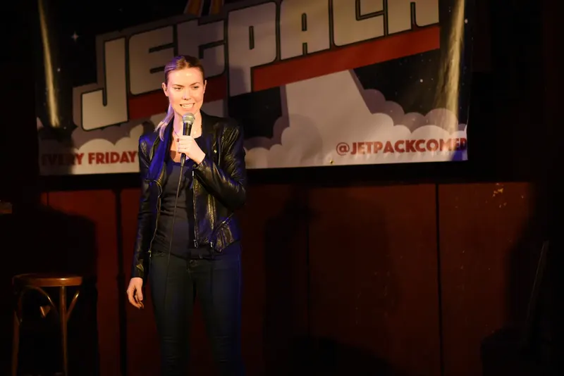 A comedian on the Jetpack stage