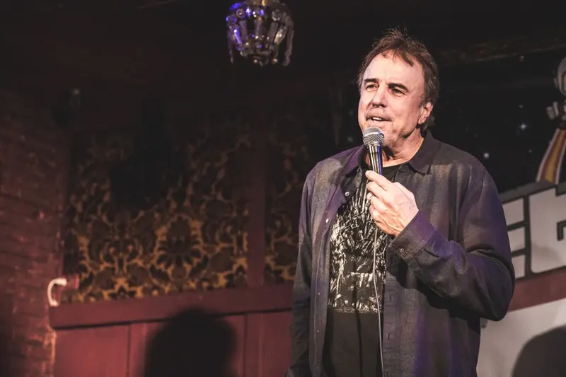 A comedian on the Jetpack stage