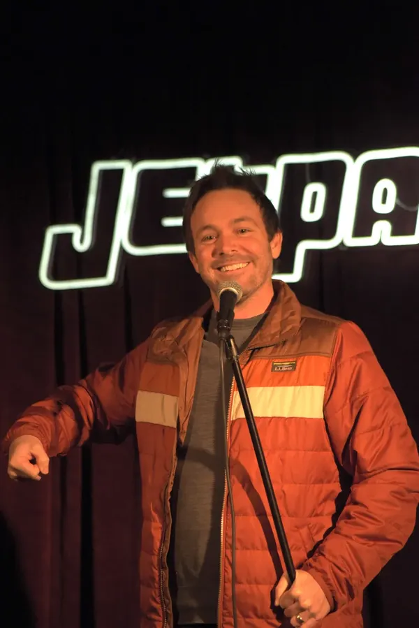 A comedian on the Jetpack stage